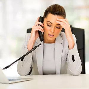 Stressed Business Woman on Phone
