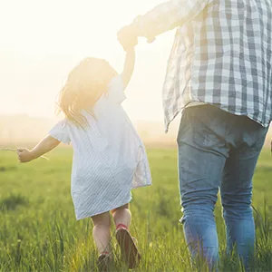 Father and Daughter in a Field