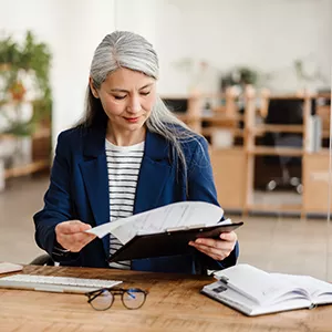 Woman Looking at Document